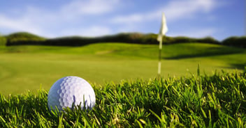 Image of a golf ball sitting on a golf course in Scottsdale, AZ