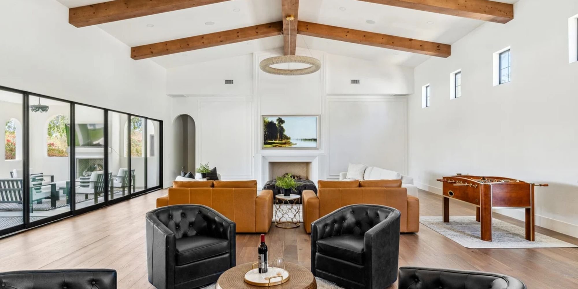 Arizona custom home by Trinity Homes featuring vaulted ceiling and exposed wood beams