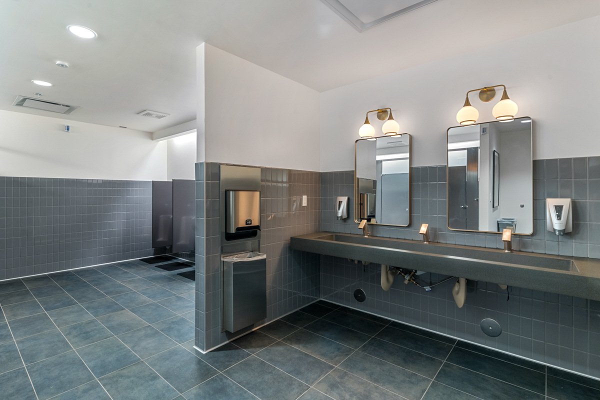 Modern restroom with tile finishes in Scottsdale commercial renovation by Trinity Homes