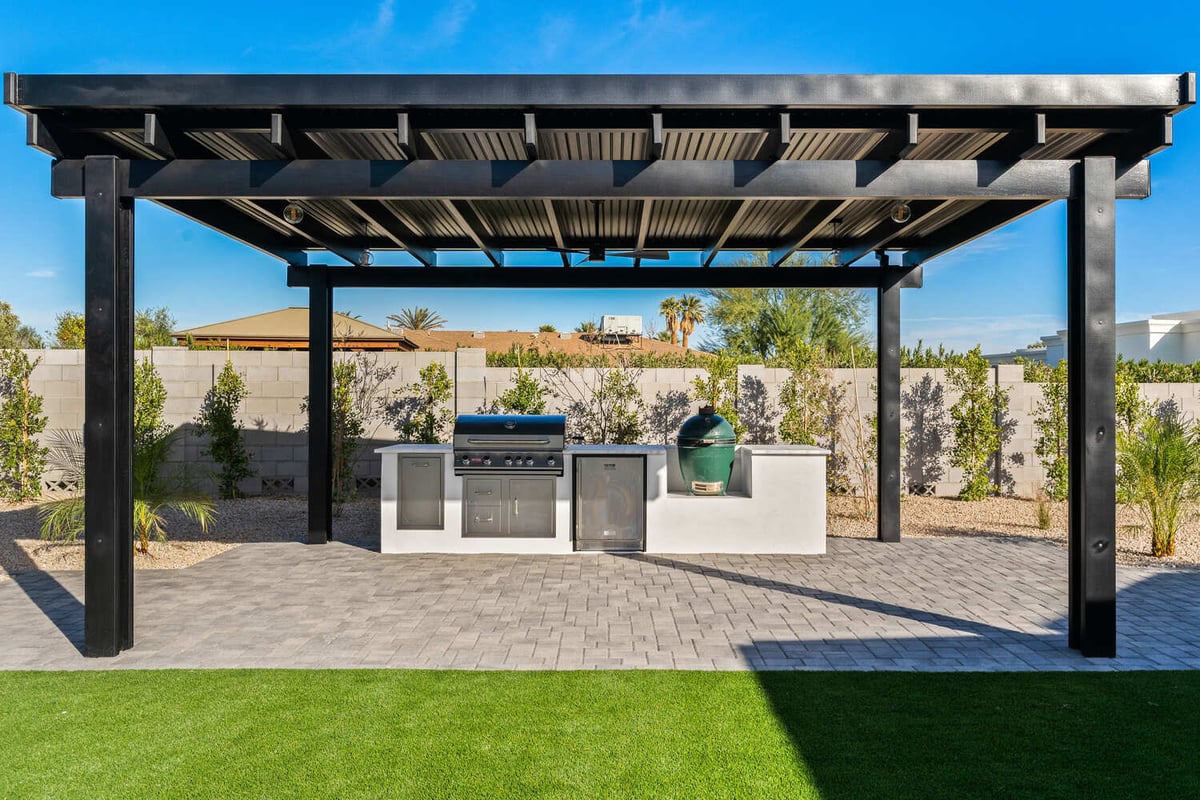 Aerial view of Scottsdale property featuring pool, outdoor kitchen, and landscaping by Trinity Homes
