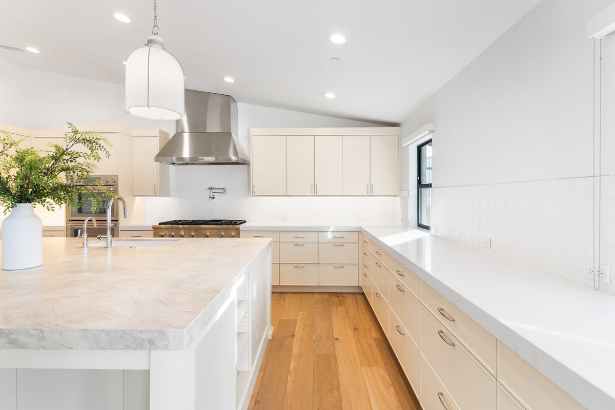 Close-up of cut crystal decanters and tile backsplash in Scottsdale kitchen remodel by Trinity Homes