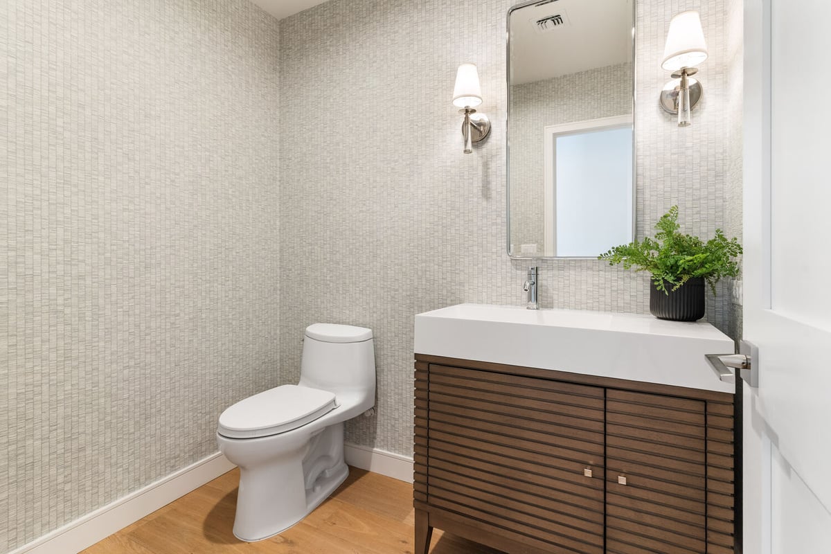 Modern powder room with sleek vanity in Scottsdale remodel by Trinity Homes