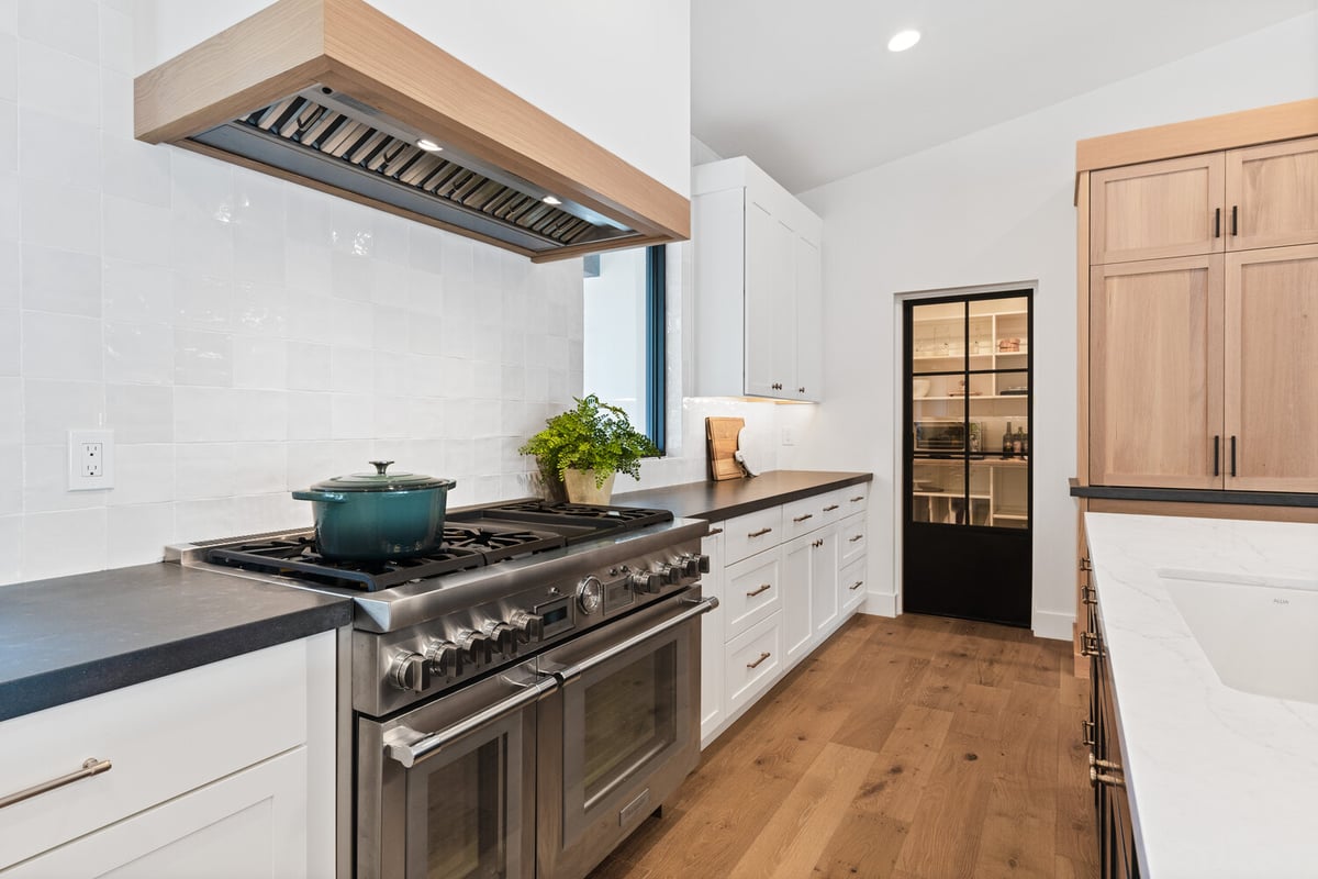 Double oven setup in custom kitchen remodel by Trinity Homes AZ in Chandler, AZ