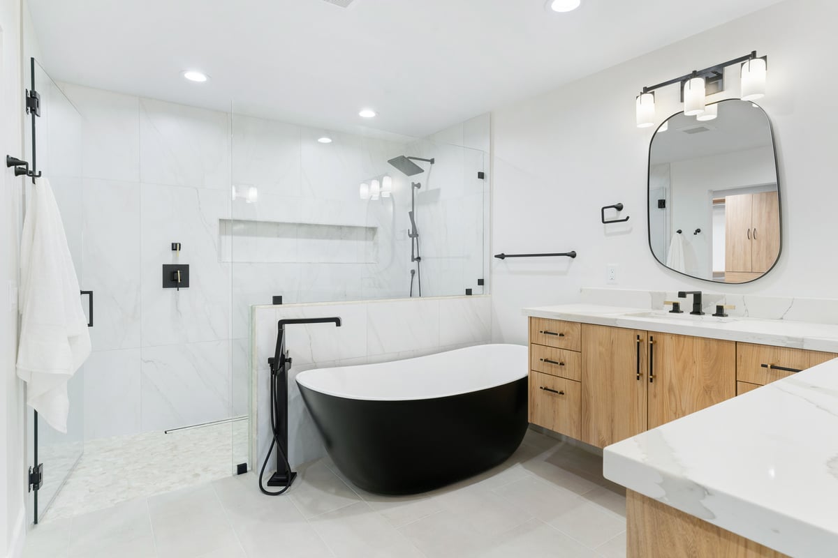 Spa-style bathroom with freestanding tub and glass shower by Trinity Homes in Scottsdale, AZ