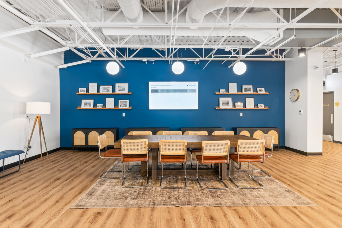 Blue accent wall meeting room in Scottsdale commercial remodel by Trinity Homes