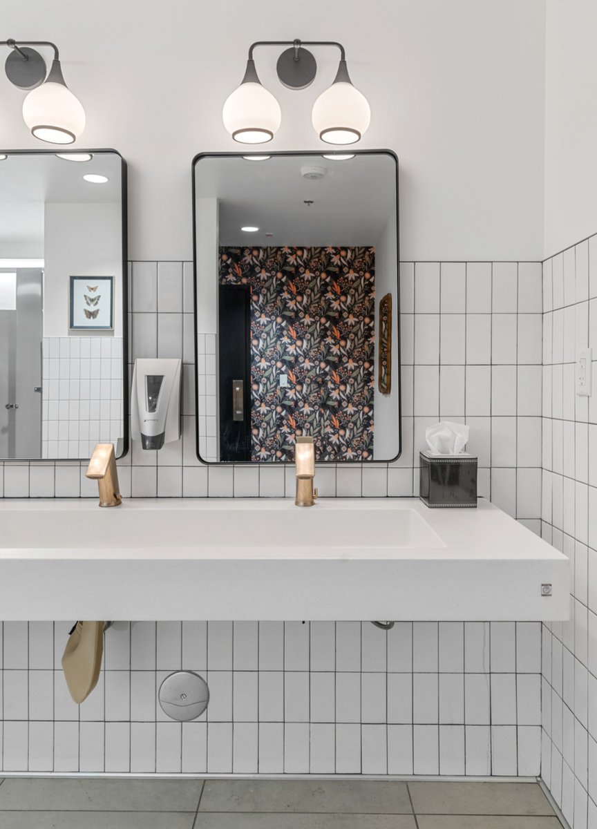 Remodeled church bathroom with floating sink and subway tile in Scottsdale, AZ
