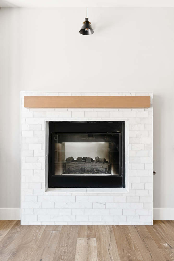 Trinity Homes AZ features a modern fireplace design in this North Peoria custom living space