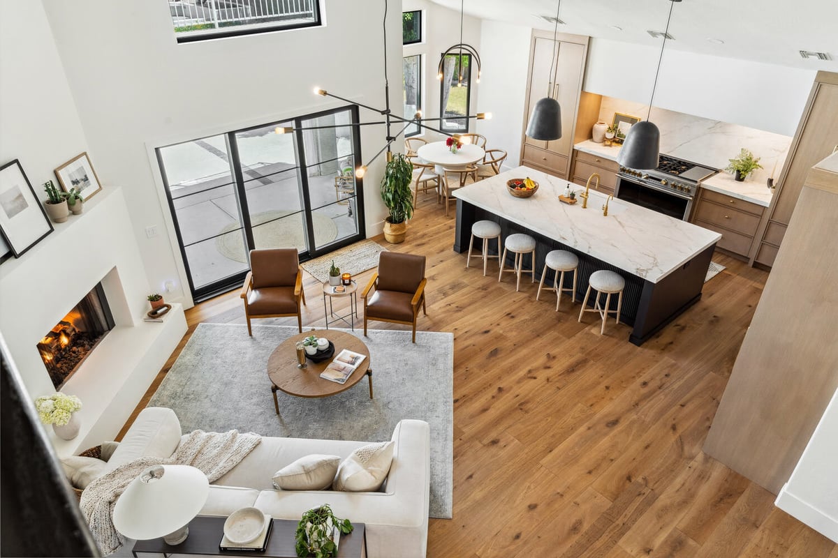 Elevated view of kitchen and lounge area in a Trinity Homes whole home remodel in Gilbert, AZ