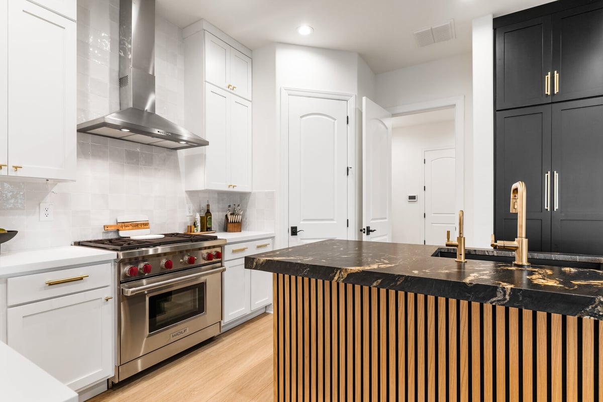 Trinity Homes Kitchen remodel in Phoenix with tall black cabinets