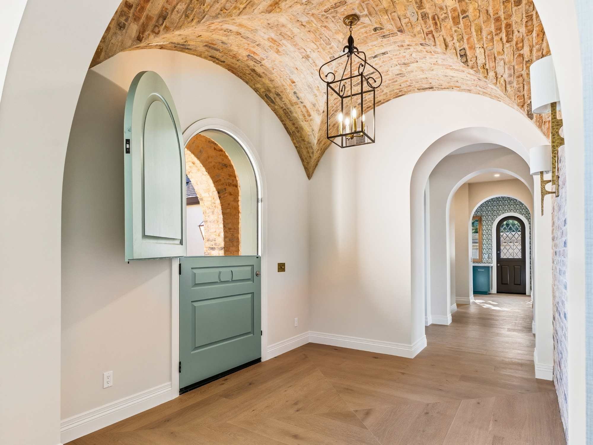 Brick barrel ceiling at the entryway to a custom home by Trinity Homes AZ