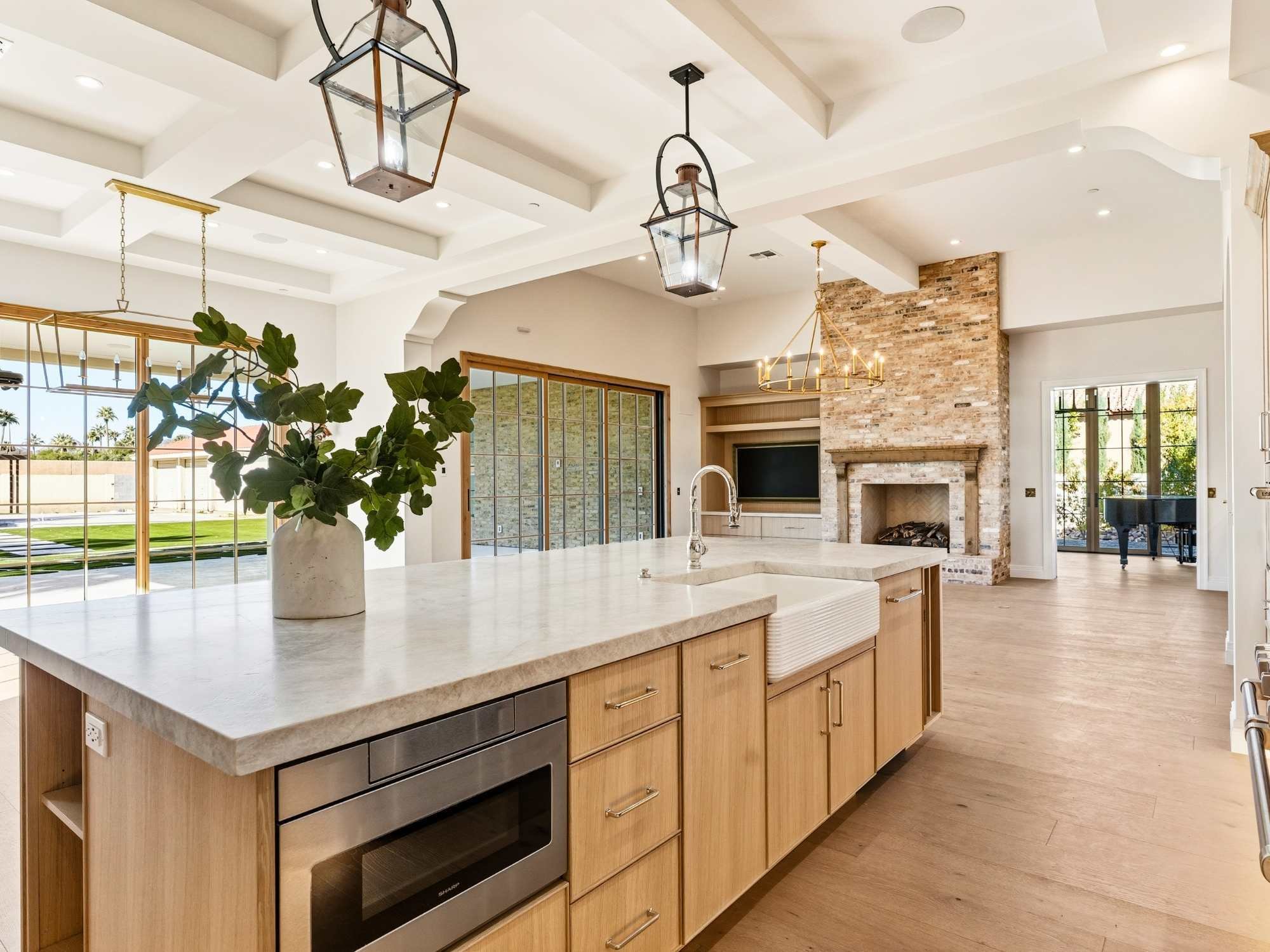 Large island in an open-concept kitchen in a custom home by Trinity Homes AZ Large island in an open-concept kitchen in a custom home by Trinity Homes AZ