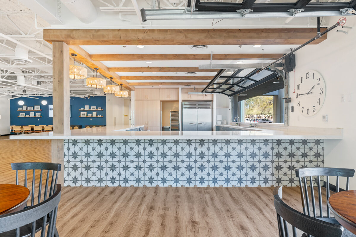 Tiled bar area and kitchen space in Trinity Homes’ Scottsdale commercial remodel