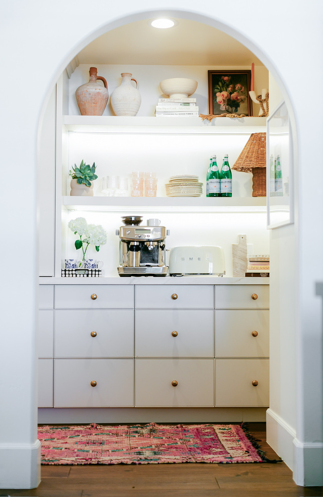 Built-in coffee and beverage bar in Phoenix home remodel by Trinity Homes