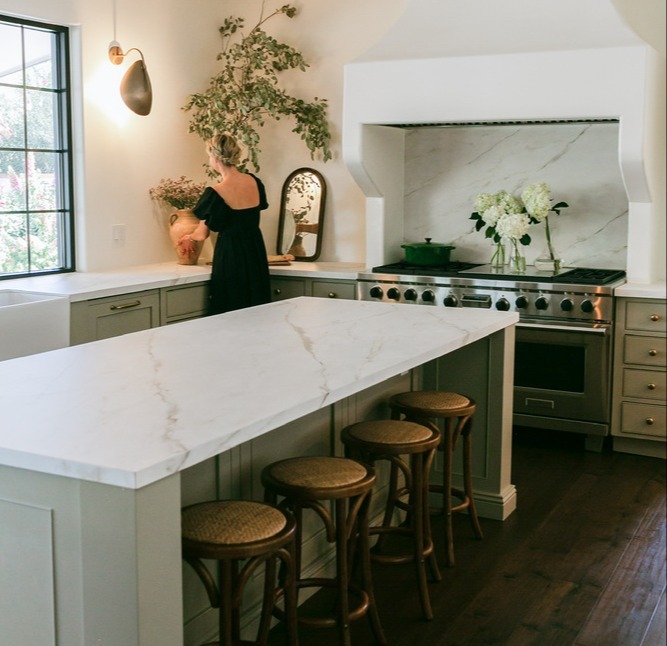Trinity Homes Phoenix kitchen renovation with marble island and custom hood range