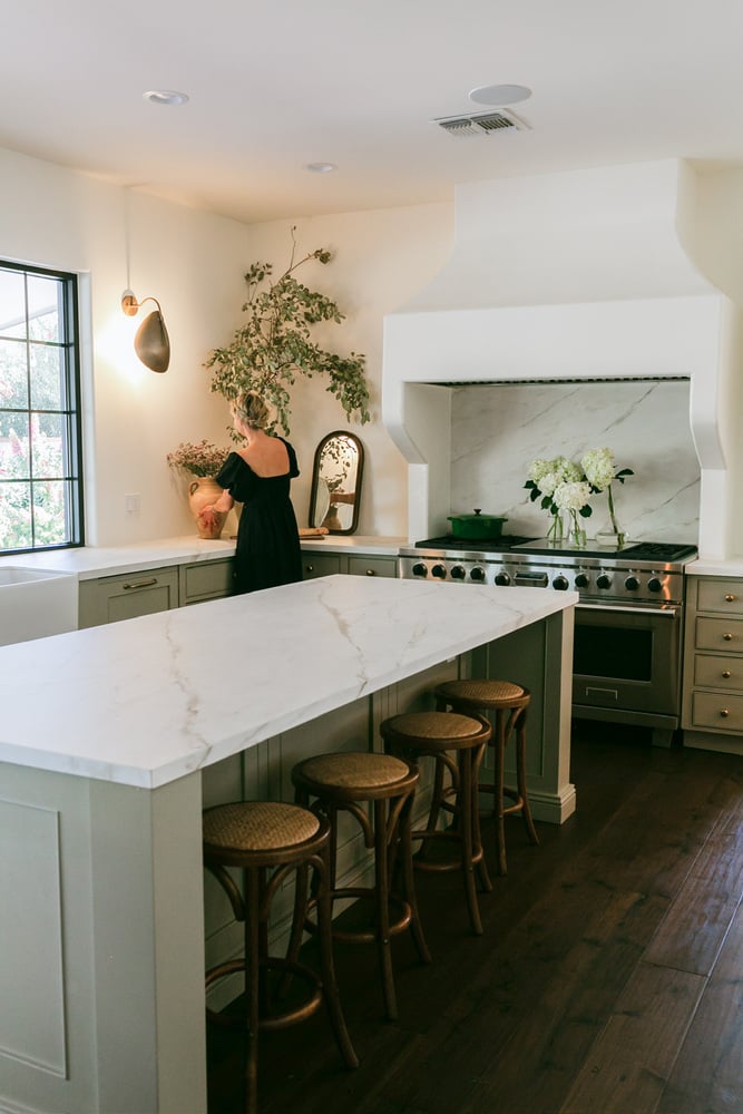 Trinity Homes Phoenix kitchen renovation with marble island and custom hood range