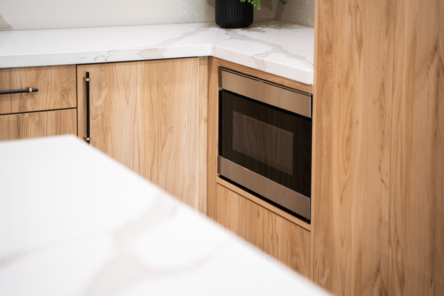Wooden cabinets in modern Scottsdale kitchen remodel by Trinity Homes
