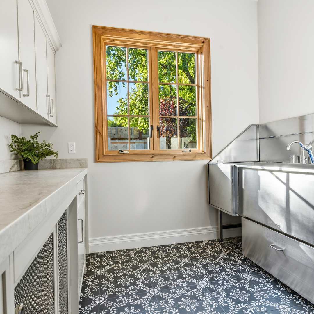 Stainless steel washing station in a back kitchen in paradise valley by Trinity Homes AZ